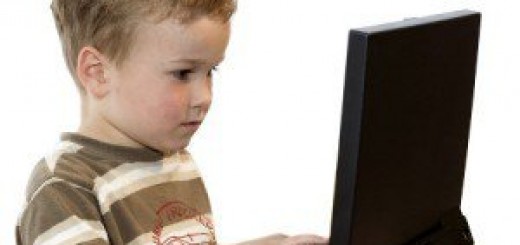 A boy using a laptop